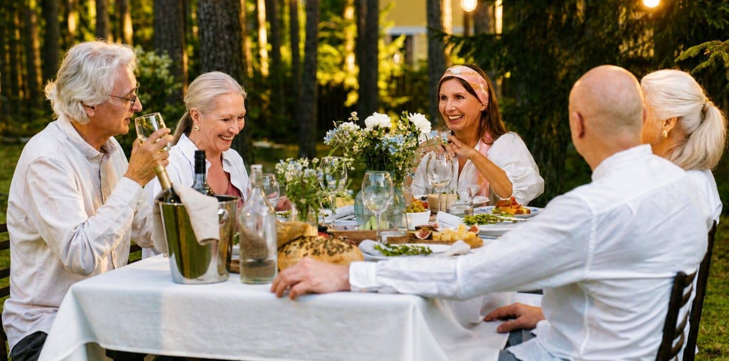 group of old friends dining al fresco