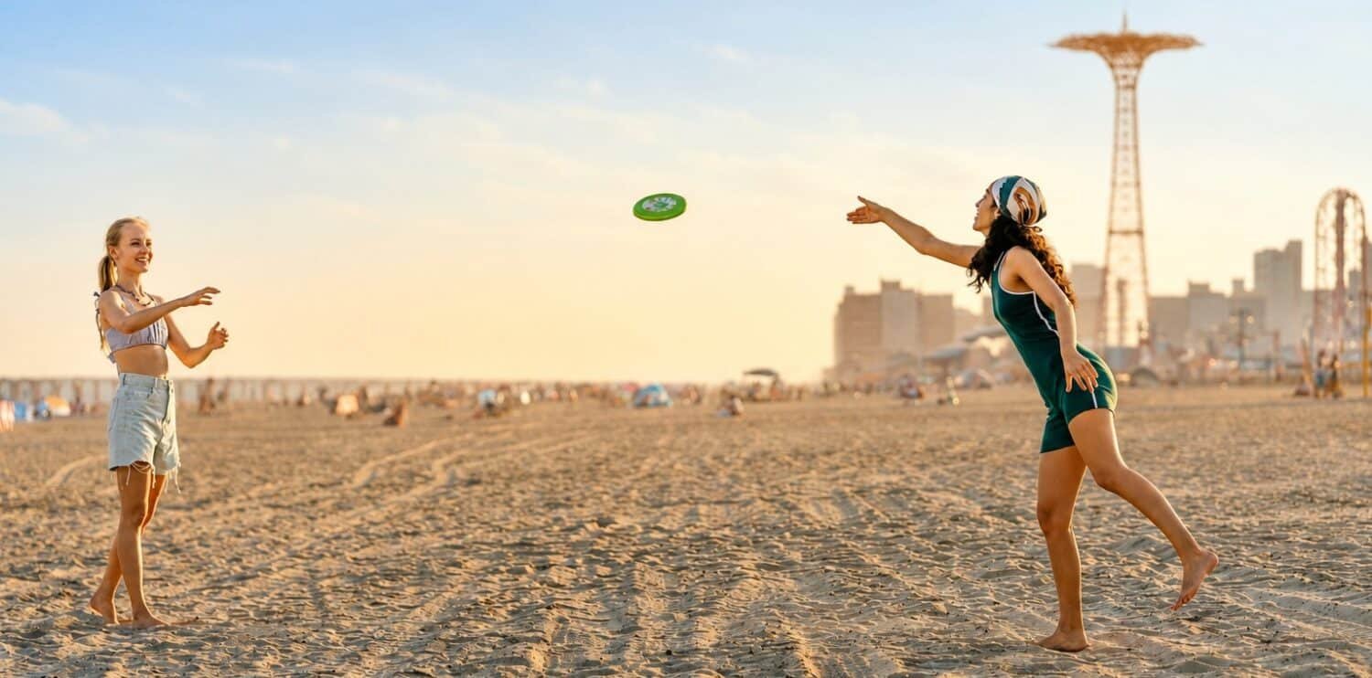 Playing frisbee at the beach