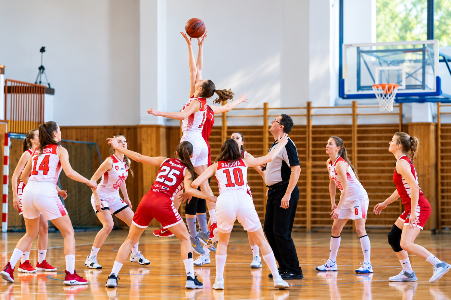 women's basketball tip off in the gym